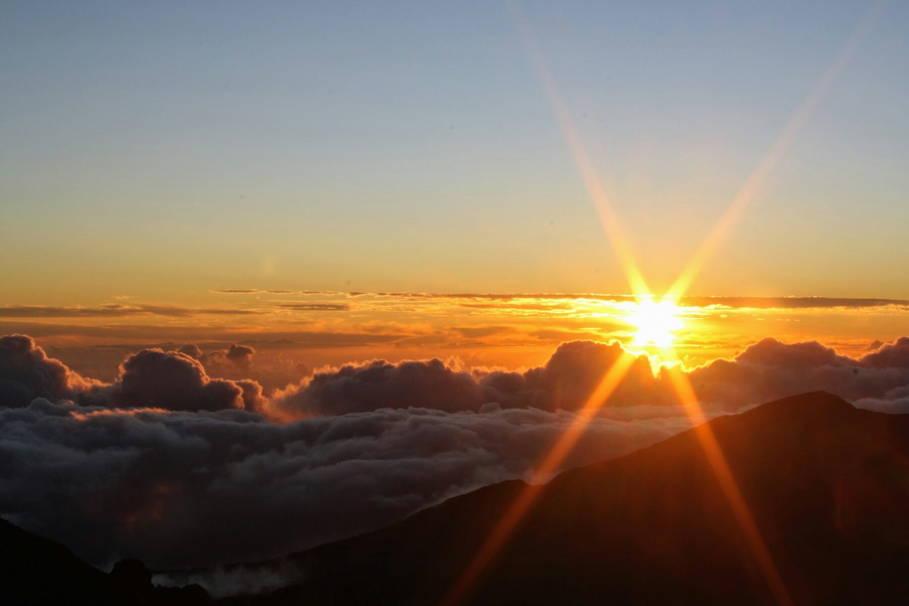 Sunburst over the cloud sea